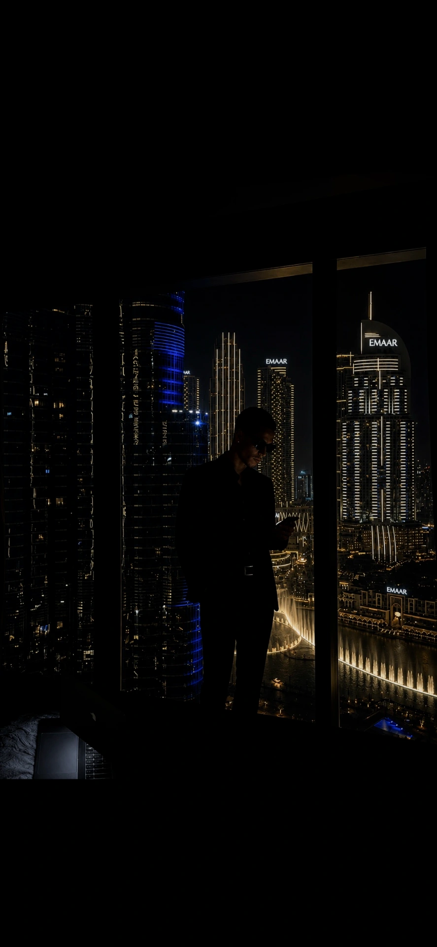 John Tyler overlooking the Dubai skyline at night